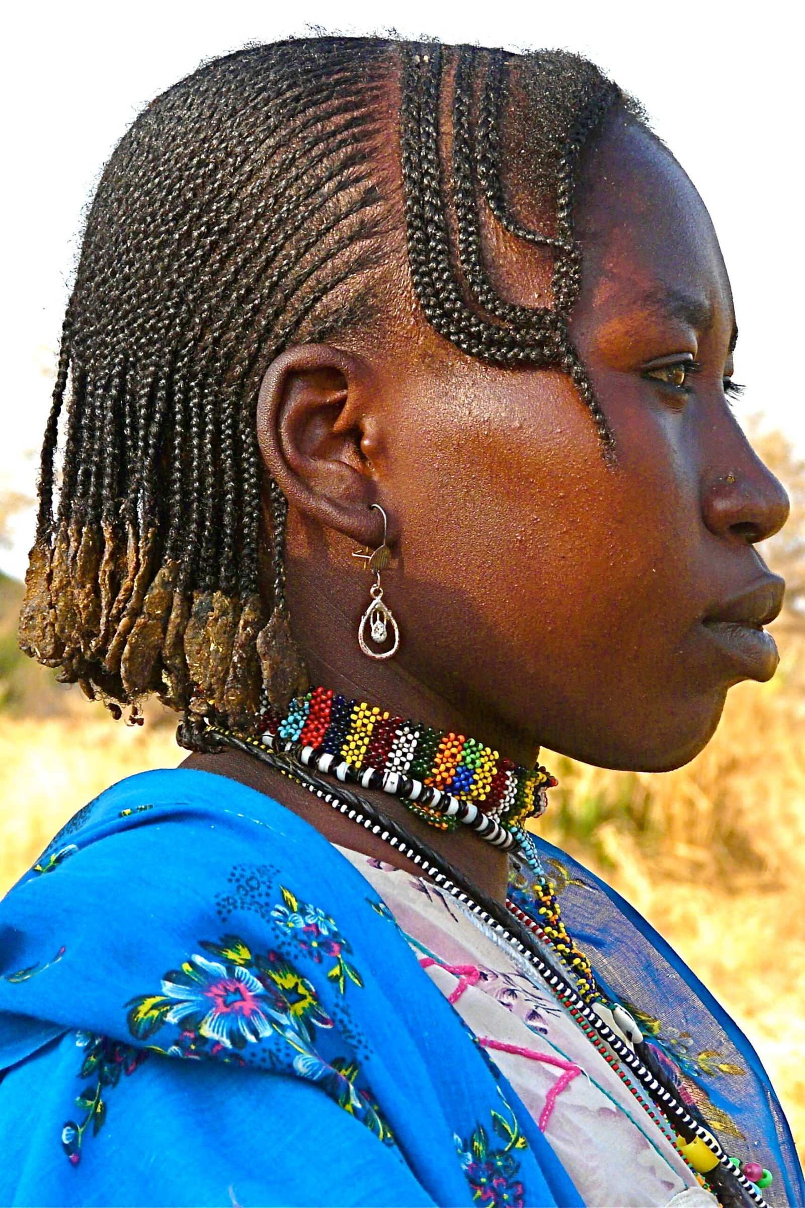 Nuba woman with cornrow braids